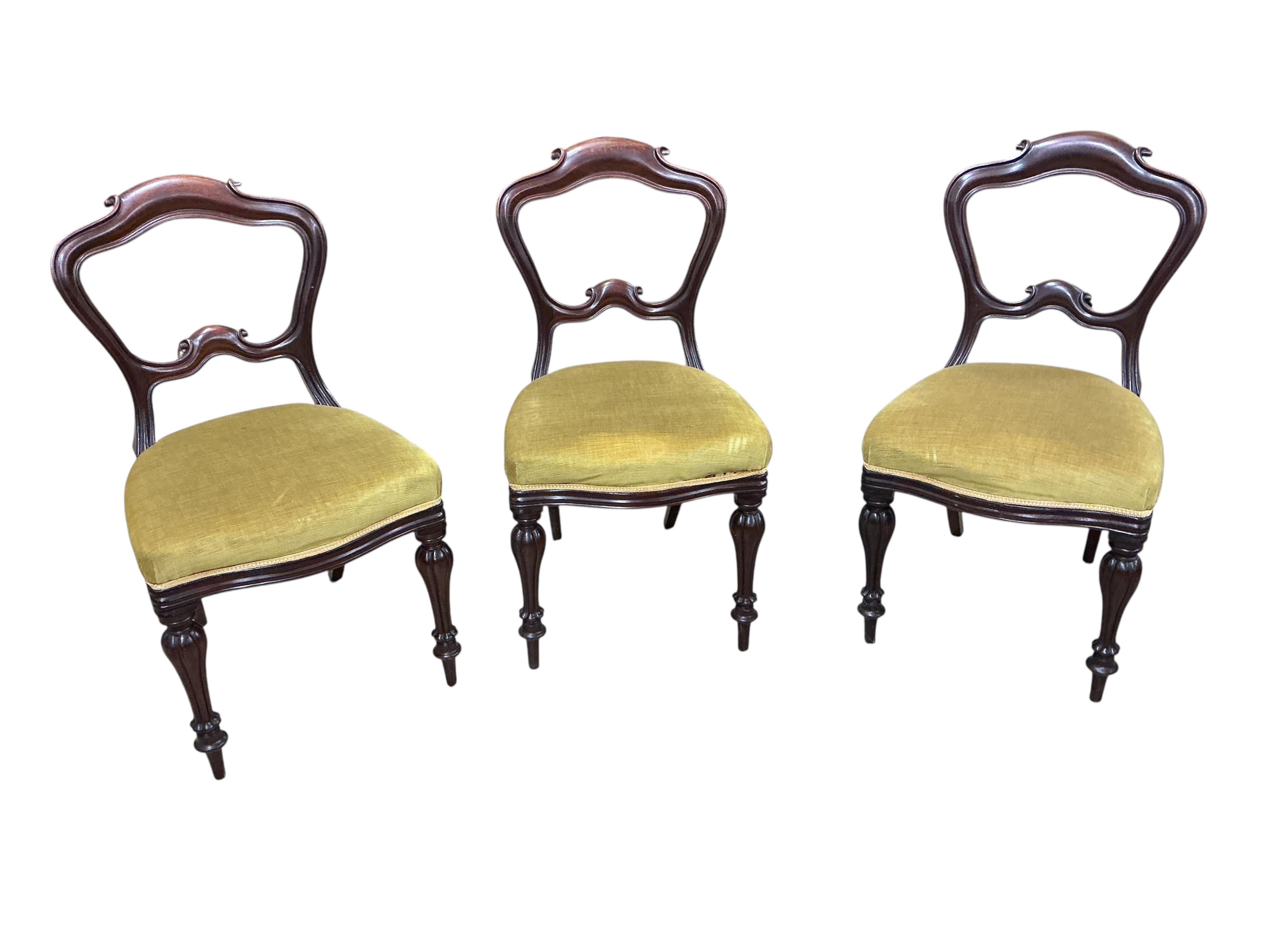 A set of six Victorian mahogany balloon back dining chairs, width 47cm, height 89cm